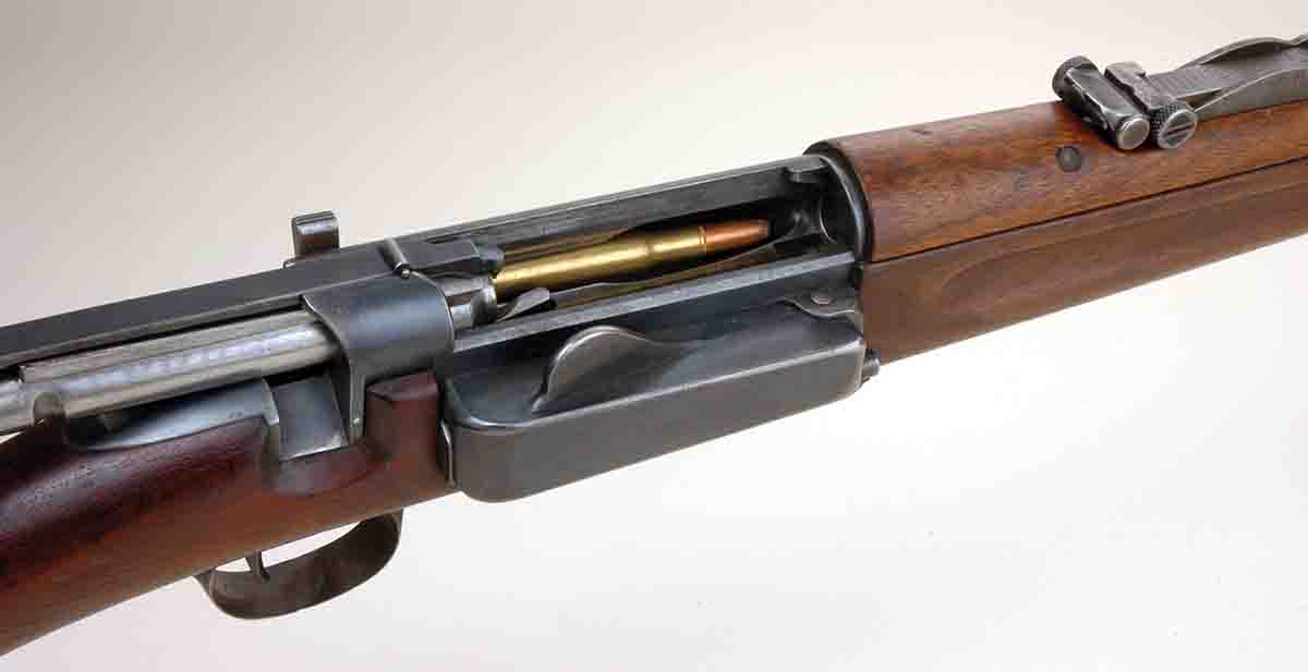 The Krag rifle design such as Mike’s Model 1896, is loaded on the right side of the receiver, then the cartridges are fed under it and up on the left side.